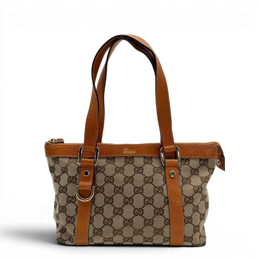 https://cdn.shopify.com/s/files/1/0564/9376/8855/files/Gucci_Handtasche_Abbey_klein_monogram_beige_vintage_GG6327.webp?v=1778676378