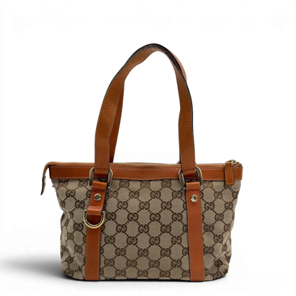 https://cdn.shopify.com/s/files/1/0564/9376/8855/files/Gucci_Handtasche_Abbey_klein_monogram_beige_vintage_GG6328.webp?v=1778676378
