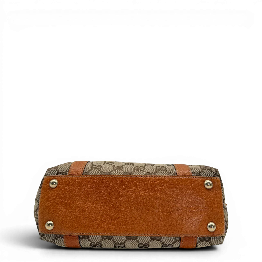 https://cdn.shopify.com/s/files/1/0564/9376/8855/files/Gucci_Handtasche_Abbey_klein_monogram_beige_vintage_GG6332.webp?v=1778676378