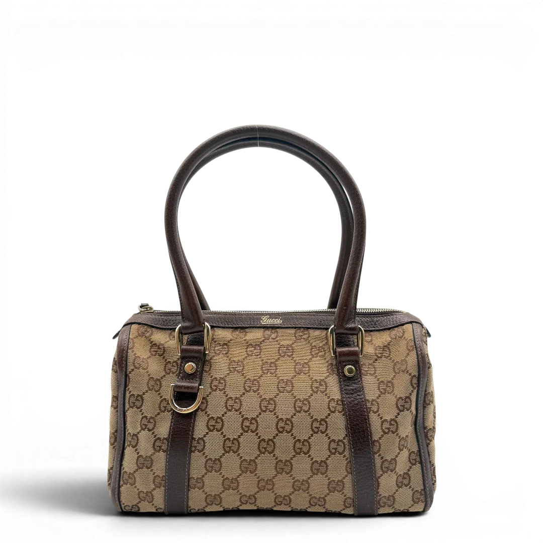 https://cdn.shopify.com/s/files/1/0564/9376/8855/files/Gucci_Handtasche_Abbey_langlich_monogram_beige_1.webp?v=1781712916