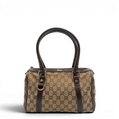 https://cdn.shopify.com/s/files/1/0564/9376/8855/files/Gucci_Handtasche_Abbey_langlich_monogram_beige_1.webp?v=1781712916
