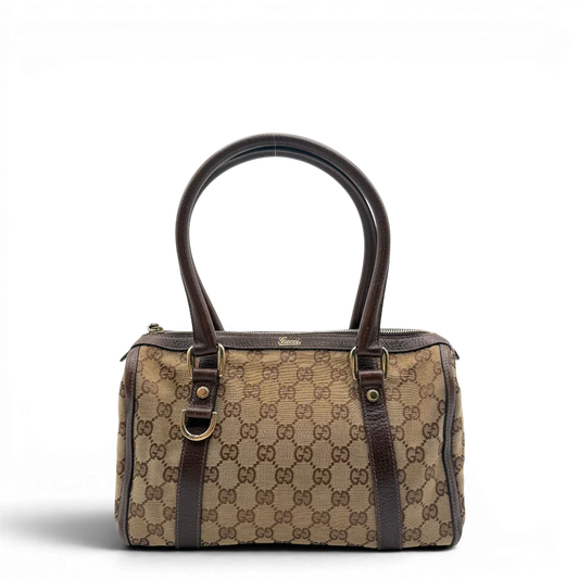 https://cdn.shopify.com/s/files/1/0564/9376/8855/files/Gucci_Handtasche_Abbey_langlich_monogram_beige_1.webp?v=1781712916