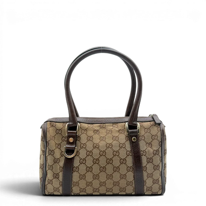 https://cdn.shopify.com/s/files/1/0564/9376/8855/files/Gucci_Handtasche_Abbey_langlich_monogram_beige_2.webp?v=1781712916