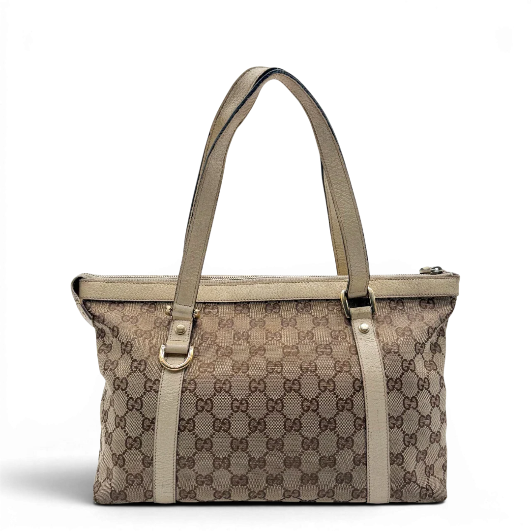 https://cdn.shopify.com/s/files/1/0564/9376/8855/files/Gucci_Handtasche_Abbey_monogram_beige_vintage_GG6309.webp?v=1778676786