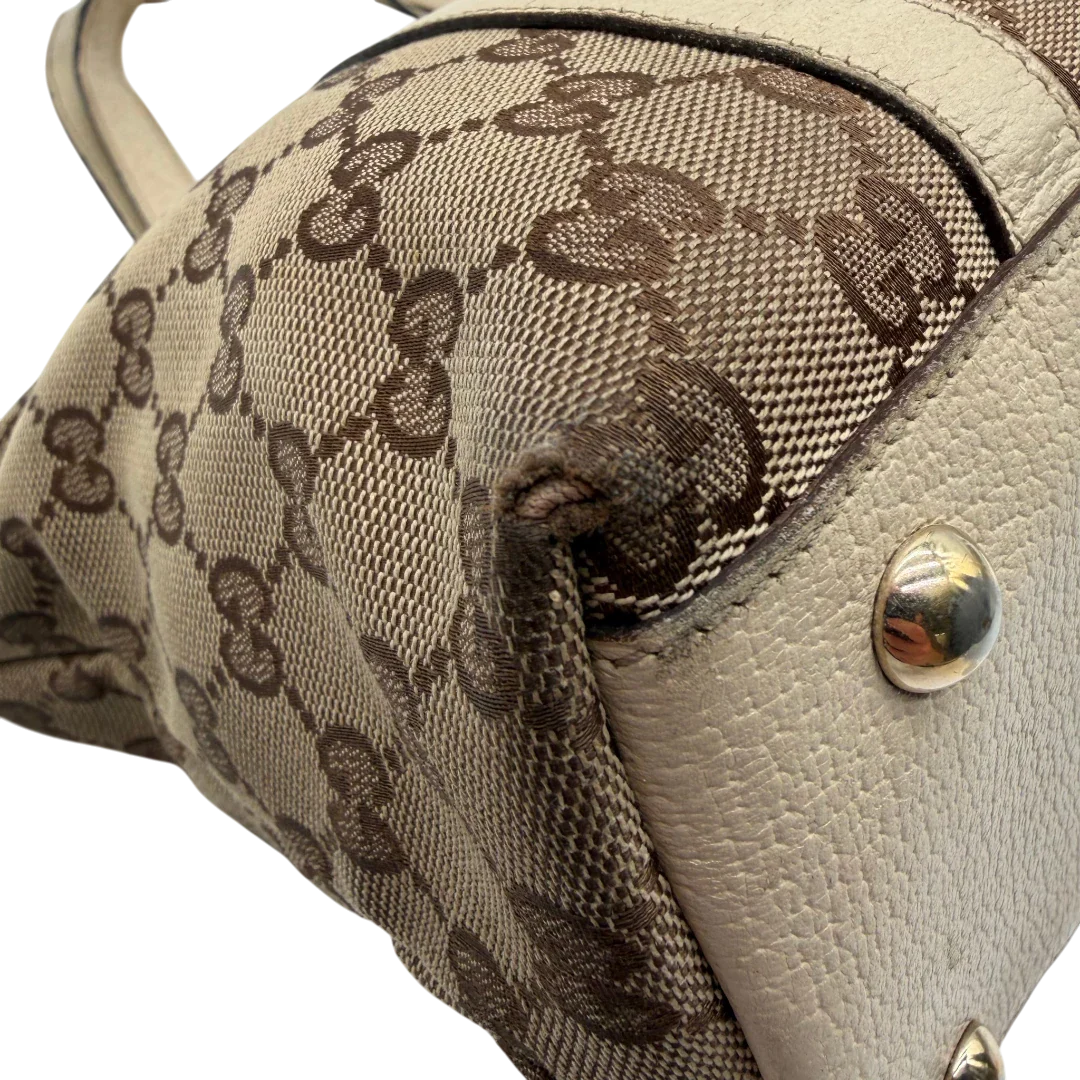 https://cdn.shopify.com/s/files/1/0564/9376/8855/files/Gucci_Handtasche_Abbey_monogram_beige_vintage_GG6315.webp?v=1778676787