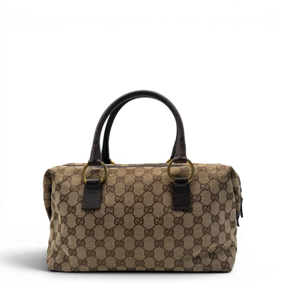 https://cdn.shopify.com/s/files/1/0564/9376/8855/files/Gucci_Handtasche_Balthus_langlich_monogram_beige_vintage_GG7441.webp?v=1779964370