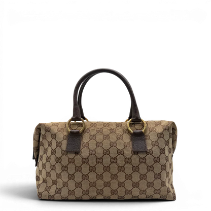 https://cdn.shopify.com/s/files/1/0564/9376/8855/files/Gucci_Handtasche_Balthus_langlich_monogram_beige_vintage_GG7443.webp?v=1779964370