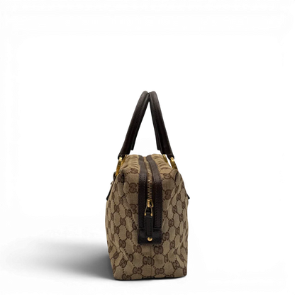 https://cdn.shopify.com/s/files/1/0564/9376/8855/files/Gucci_Handtasche_Balthus_langlich_monogram_beige_vintage_GG7444.webp?v=1779964371