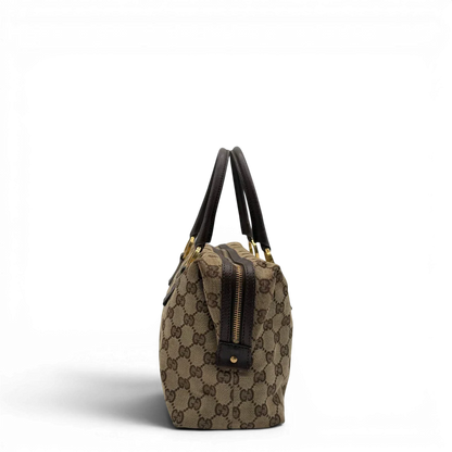 https://cdn.shopify.com/s/files/1/0564/9376/8855/files/Gucci_Handtasche_Balthus_langlich_monogram_beige_vintage_GG7445.webp?v=1779964370