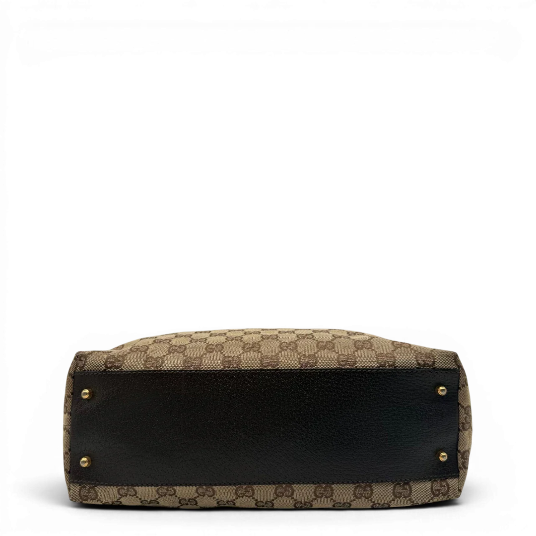 https://cdn.shopify.com/s/files/1/0564/9376/8855/files/Gucci_Handtasche_Balthus_langlich_monogram_beige_vintage_GG7446.webp?v=1779964370