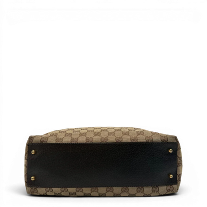 https://cdn.shopify.com/s/files/1/0564/9376/8855/files/Gucci_Handtasche_Balthus_langlich_monogram_beige_vintage_GG7446.webp?v=1779964370