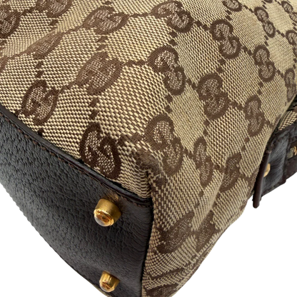 https://cdn.shopify.com/s/files/1/0564/9376/8855/files/Gucci_Handtasche_Balthus_langlich_monogram_beige_vintage_GG7449.webp?v=1779964370