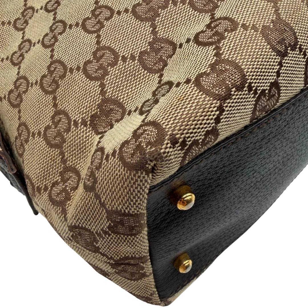 https://cdn.shopify.com/s/files/1/0564/9376/8855/files/Gucci_Handtasche_Balthus_langlich_monogram_beige_vintage_GG7450.webp?v=1779964370