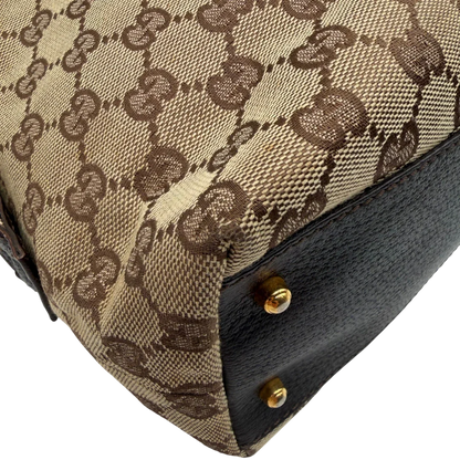 https://cdn.shopify.com/s/files/1/0564/9376/8855/files/Gucci_Handtasche_Balthus_langlich_monogram_beige_vintage_GG7450.webp?v=1779964370