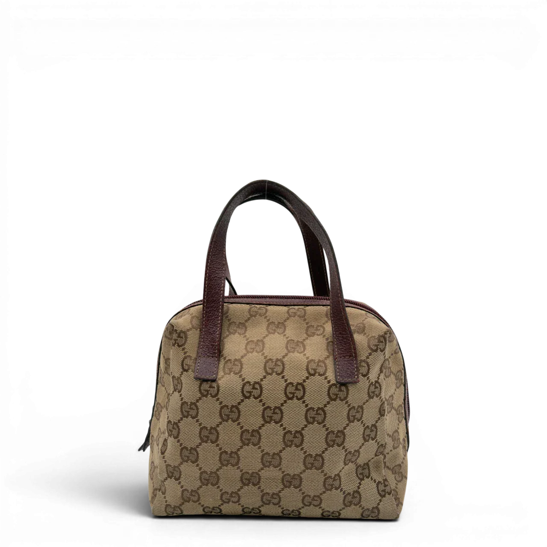 https://cdn.shopify.com/s/files/1/0564/9376/8855/files/Gucci_Handtasche_Balthus_monogram_beige_1.webp?v=1782909551