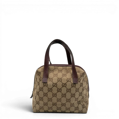 https://cdn.shopify.com/s/files/1/0564/9376/8855/files/Gucci_Handtasche_Balthus_monogram_beige_1.webp?v=1782909551