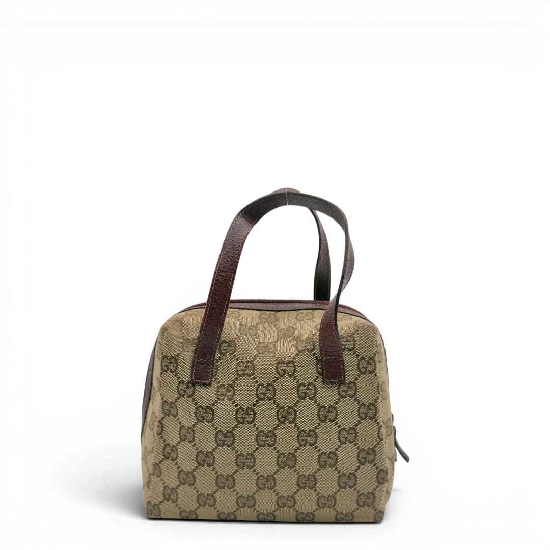 https://cdn.shopify.com/s/files/1/0564/9376/8855/files/Gucci_Handtasche_Balthus_monogram_beige_2.webp?v=1782909551
