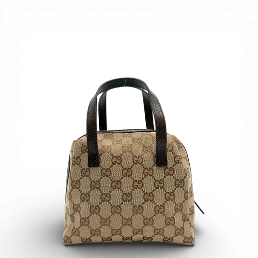 https://cdn.shopify.com/s/files/1/0564/9376/8855/files/Gucci_Handtasche_Balthus_monogram_beige_vintage_GG_0167.webp?v=1771409168