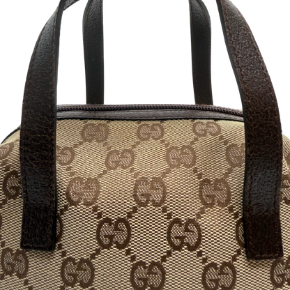 https://cdn.shopify.com/s/files/1/0564/9376/8855/files/Gucci_Handtasche_Balthus_monogram_beige_vintage_GG_0183.webp?v=1771409218