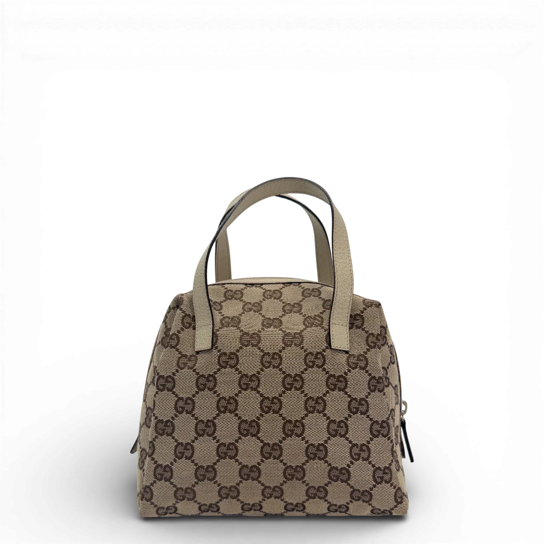 https://cdn.shopify.com/s/files/1/0564/9376/8855/files/Gucci_Handtasche_Balthus_monogram_beige_vintage_GG_9814.webp?v=1770901643