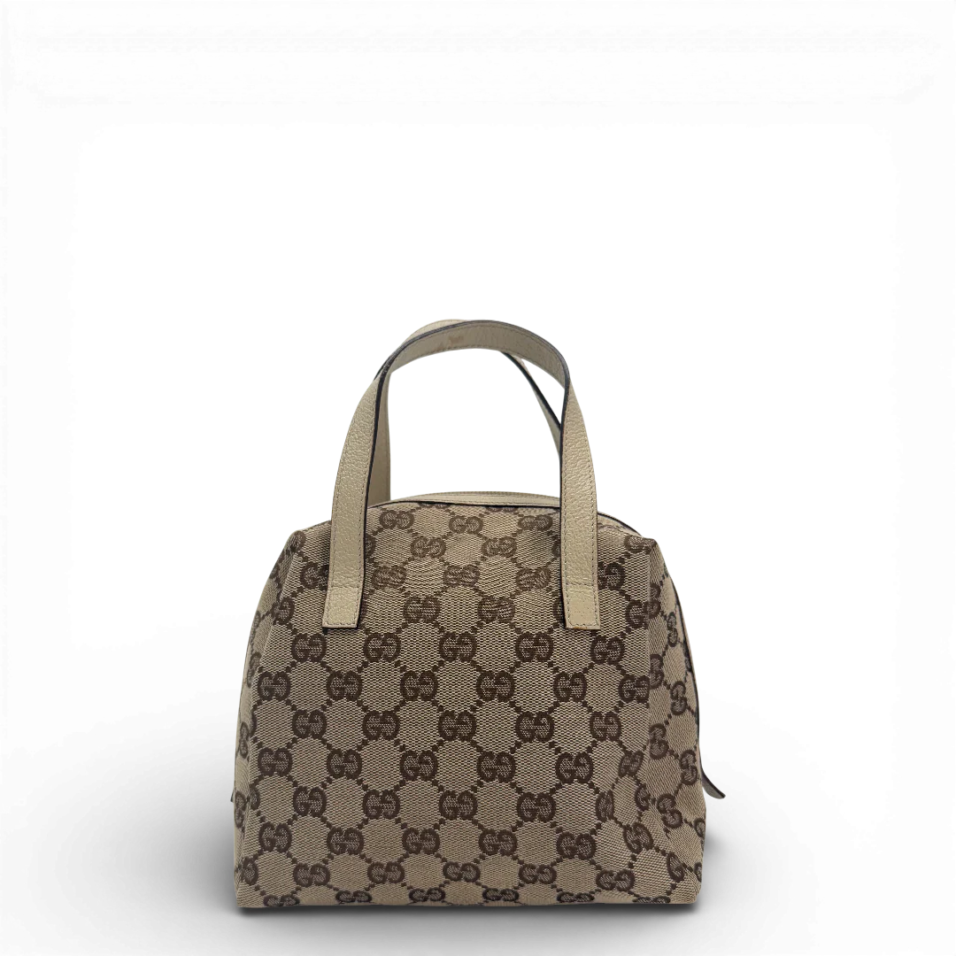 https://cdn.shopify.com/s/files/1/0564/9376/8855/files/Gucci_Handtasche_Balthus_monogram_beige_vintage_GG_9815.webp?v=1770903127