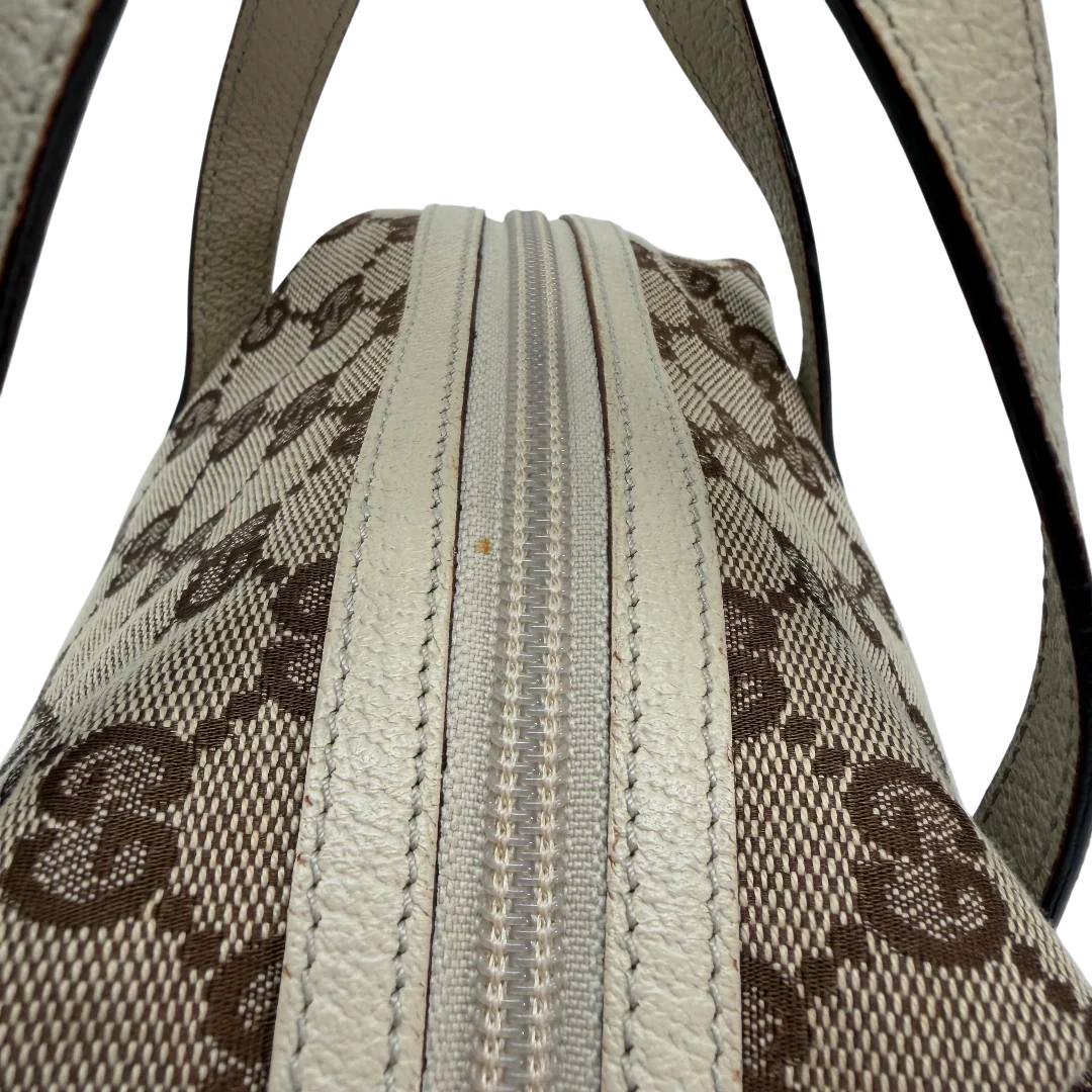 https://cdn.shopify.com/s/files/1/0564/9376/8855/files/Gucci_Handtasche_Balthus_monogram_beige_vintage_GG_9824.webp?v=1770903127