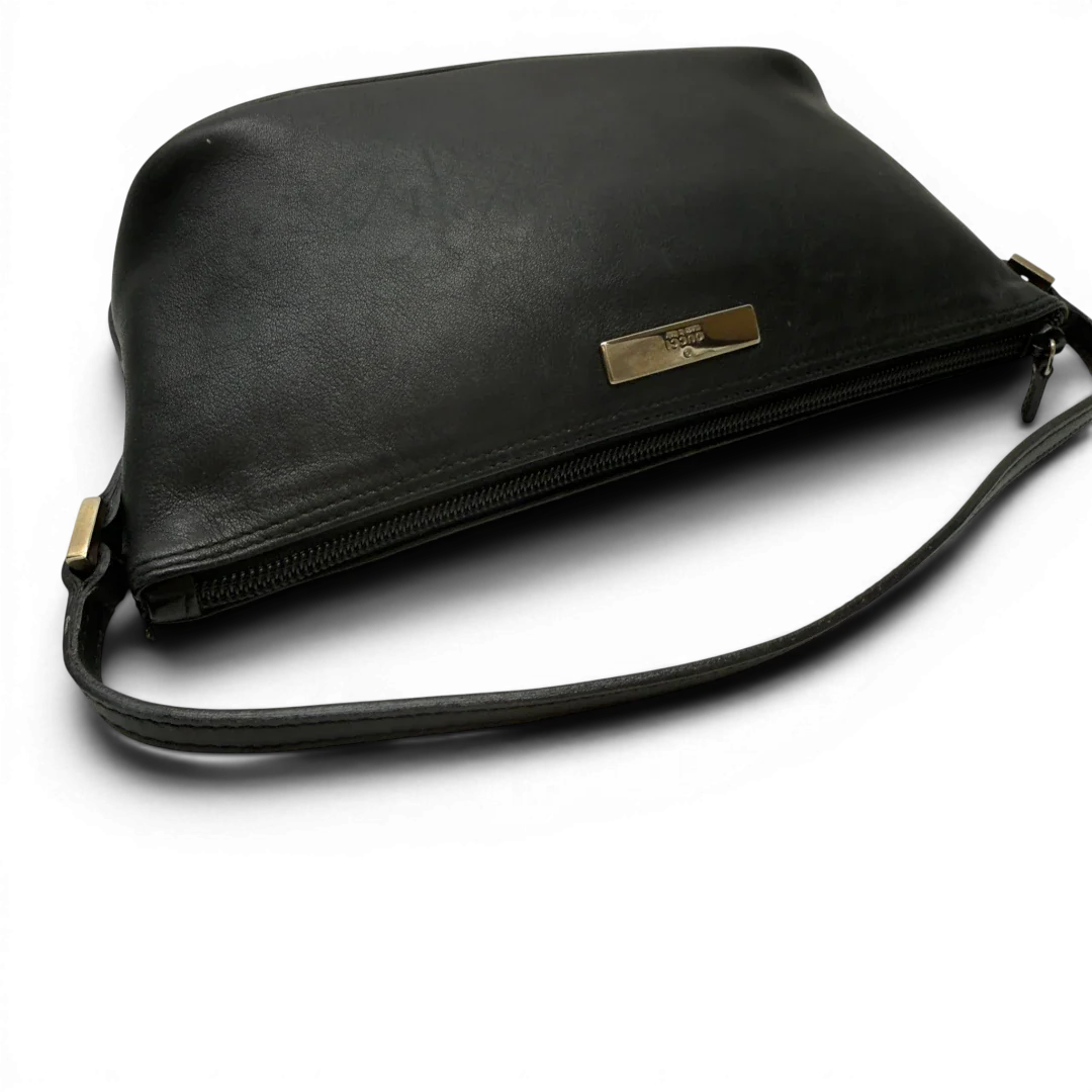 https://cdn.shopify.com/s/files/1/0564/9376/8855/files/Gucci_Handtasche_Boat_Baguette_aus_Leder_schwarz_11.webp?v=1783511319