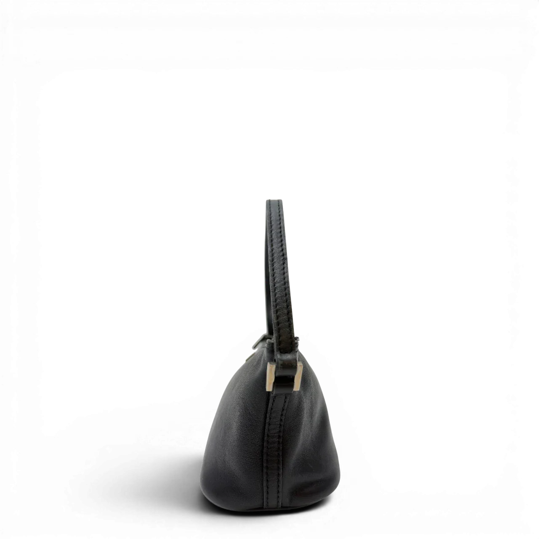 https://cdn.shopify.com/s/files/1/0564/9376/8855/files/Gucci_Handtasche_Boat_Baguette_aus_Leder_schwarz_3.webp?v=1783511319
