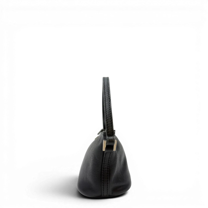 https://cdn.shopify.com/s/files/1/0564/9376/8855/files/Gucci_Handtasche_Boat_Baguette_aus_Leder_schwarz_3.webp?v=1783511319