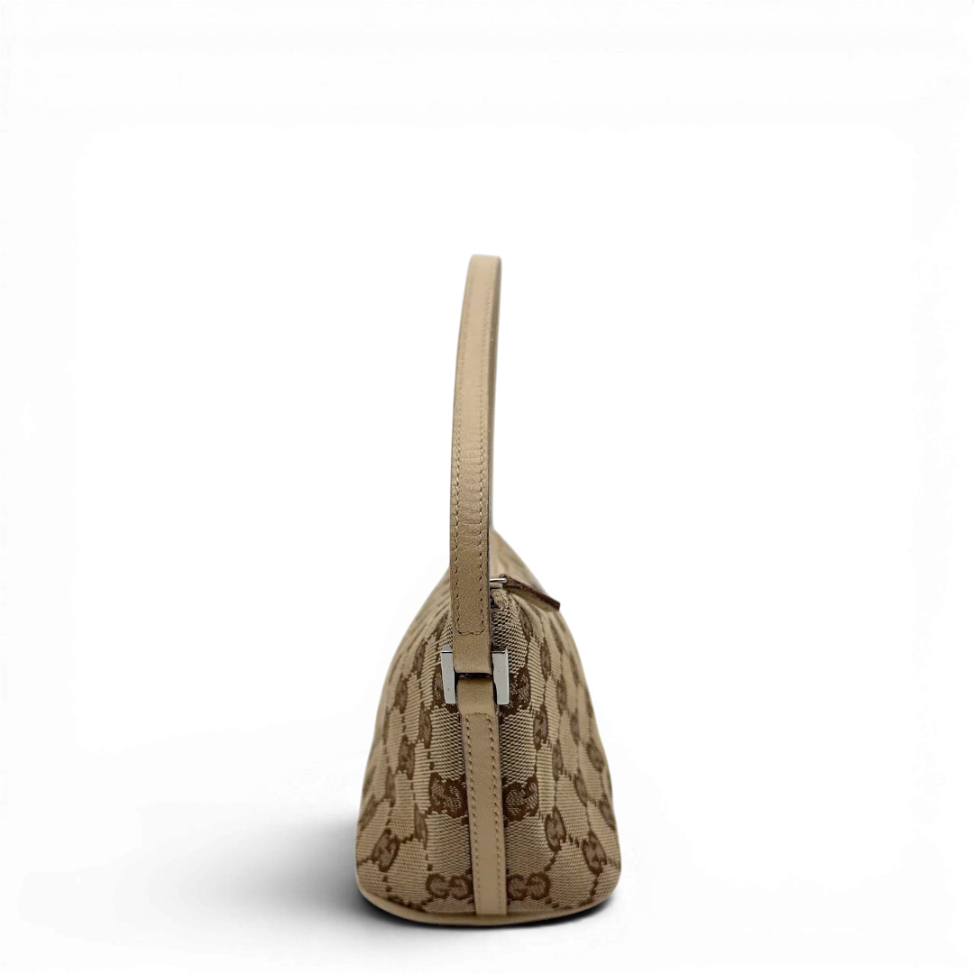 https://cdn.shopify.com/s/files/1/0564/9376/8855/files/Gucci_Handtasche_Boat_Baguette_monogram_beige_1_26efb84c-8a97-446d-a0f4-efc107b8208e.webp?v=1782910341
