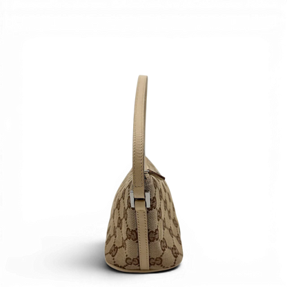 https://cdn.shopify.com/s/files/1/0564/9376/8855/files/Gucci_Handtasche_Boat_Baguette_monogram_beige_1_26efb84c-8a97-446d-a0f4-efc107b8208e.webp?v=1782910341