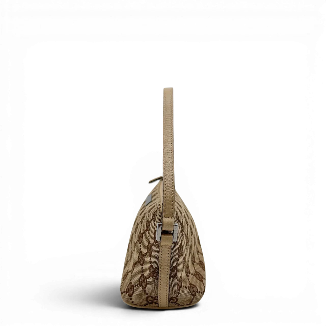 https://cdn.shopify.com/s/files/1/0564/9376/8855/files/Gucci_Handtasche_Boat_Baguette_monogram_beige_2_b0093126-a9a4-4d0b-89c9-602e37df0003.webp?v=1782910341
