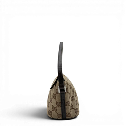 https://cdn.shopify.com/s/files/1/0564/9376/8855/files/Gucci_Handtasche_Boat_Baguette_monogram_beige_3.webp?v=1782904853