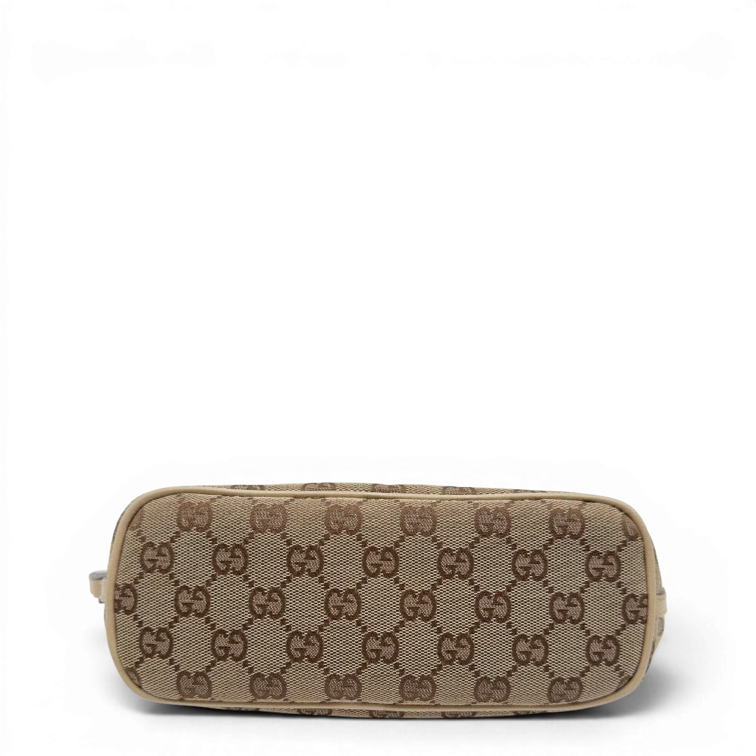 https://cdn.shopify.com/s/files/1/0564/9376/8855/files/Gucci_Handtasche_Boat_Baguette_monogram_beige_3_6539c985-2bc5-4437-bee5-5e36969b490f.webp?v=1782910342