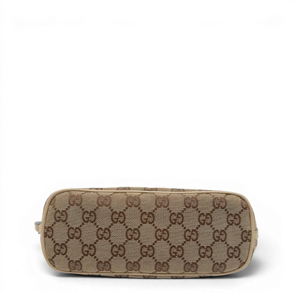 https://cdn.shopify.com/s/files/1/0564/9376/8855/files/Gucci_Handtasche_Boat_Baguette_monogram_beige_3_6539c985-2bc5-4437-bee5-5e36969b490f.webp?v=1782910342