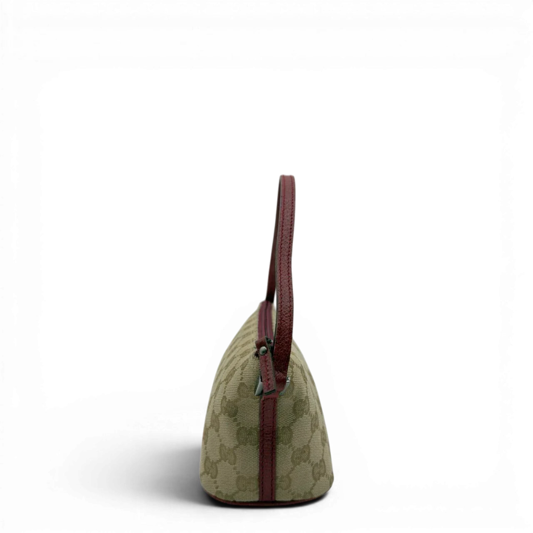 https://cdn.shopify.com/s/files/1/0564/9376/8855/files/Gucci_Handtasche_Boat_Baguette_monogram_beige_4_d7cd0c75-5a3f-4819-a40a-1735e8c978cf.webp?v=1784282633