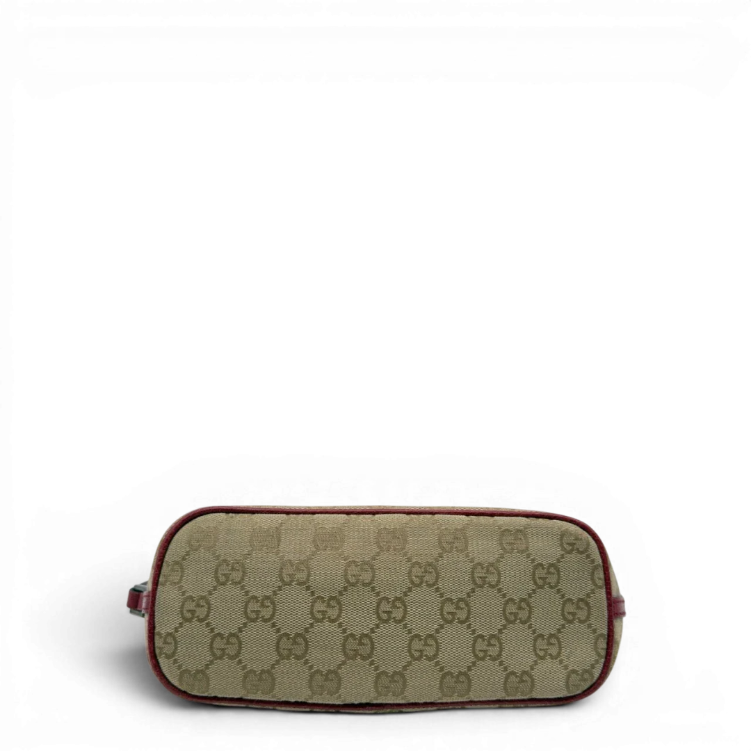 https://cdn.shopify.com/s/files/1/0564/9376/8855/files/Gucci_Handtasche_Boat_Baguette_monogram_beige_5_0dfcb980-30ab-48ca-8ed2-36933cb88375.webp?v=1784282634