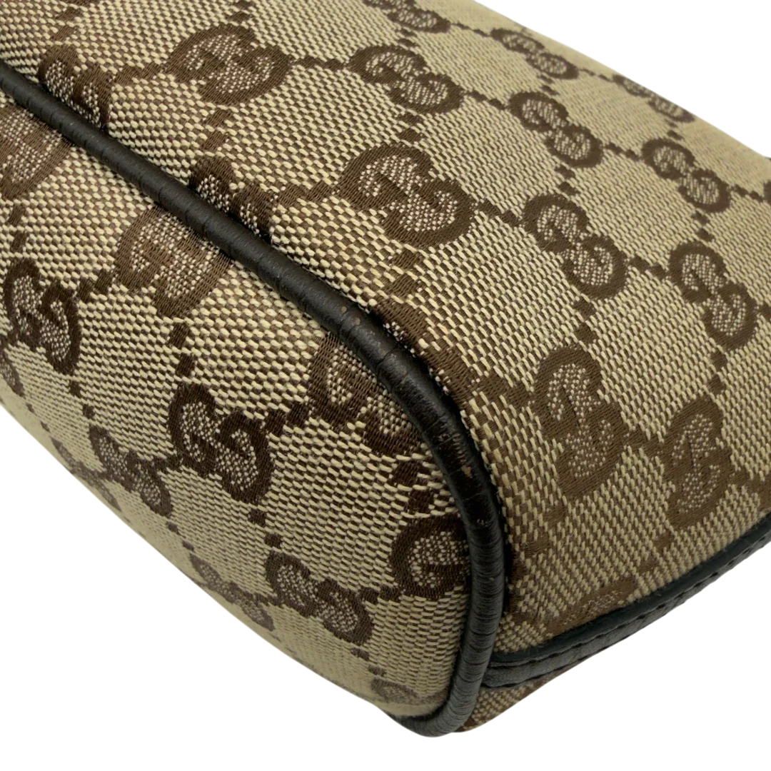 https://cdn.shopify.com/s/files/1/0564/9376/8855/files/Gucci_Handtasche_Boat_Baguette_monogram_beige_6.webp?v=1782904853
