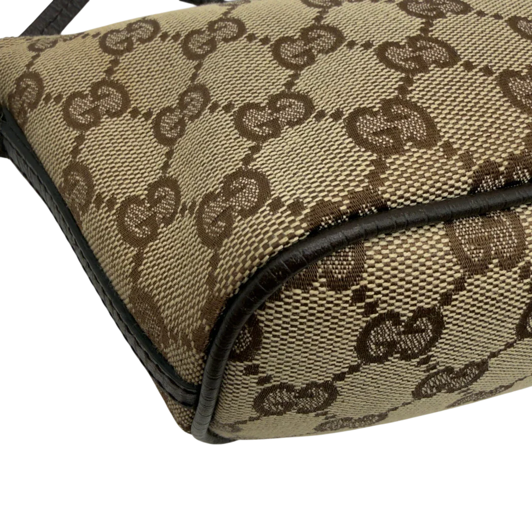 https://cdn.shopify.com/s/files/1/0564/9376/8855/files/Gucci_Handtasche_Boat_Baguette_monogram_beige_7.webp?v=1782904853