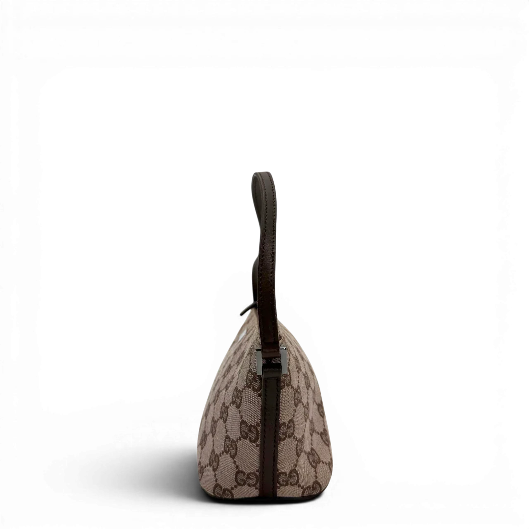 https://cdn.shopify.com/s/files/1/0564/9376/8855/files/Gucci_Handtasche_Boat_Baguette_monogram_beige_vintage_GG6363_3f88fa48-5a5d-44db-9bbd-b708b5b04437.webp?v=1778669169