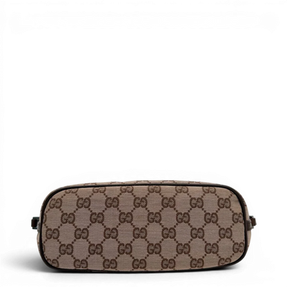 https://cdn.shopify.com/s/files/1/0564/9376/8855/files/Gucci_Handtasche_Boat_Baguette_monogram_beige_vintage_GG6365_3b6a0f71-1458-4c14-82fc-936af495ab94.webp?v=1778669169