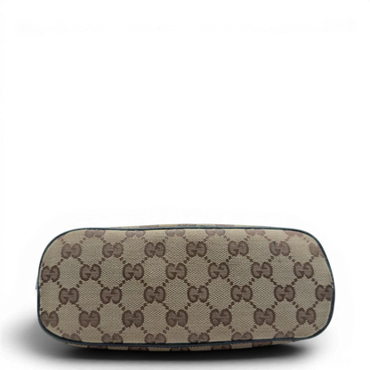 https://cdn.shopify.com/s/files/1/0564/9376/8855/files/Gucci_Handtasche_Boat_Baguette_monogram_beige_vintage_GG7304.webp?v=1778683624
