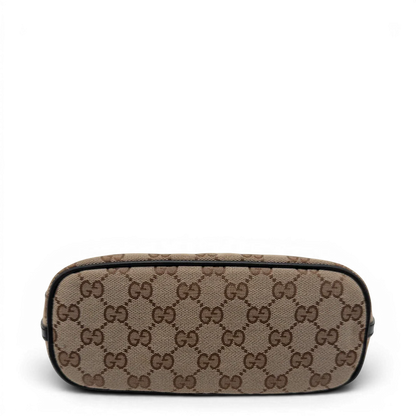 https://cdn.shopify.com/s/files/1/0564/9376/8855/files/Gucci_Handtasche_Boat_Baguette_monogram_beige_vintage_GG7589.webp?v=1779289596