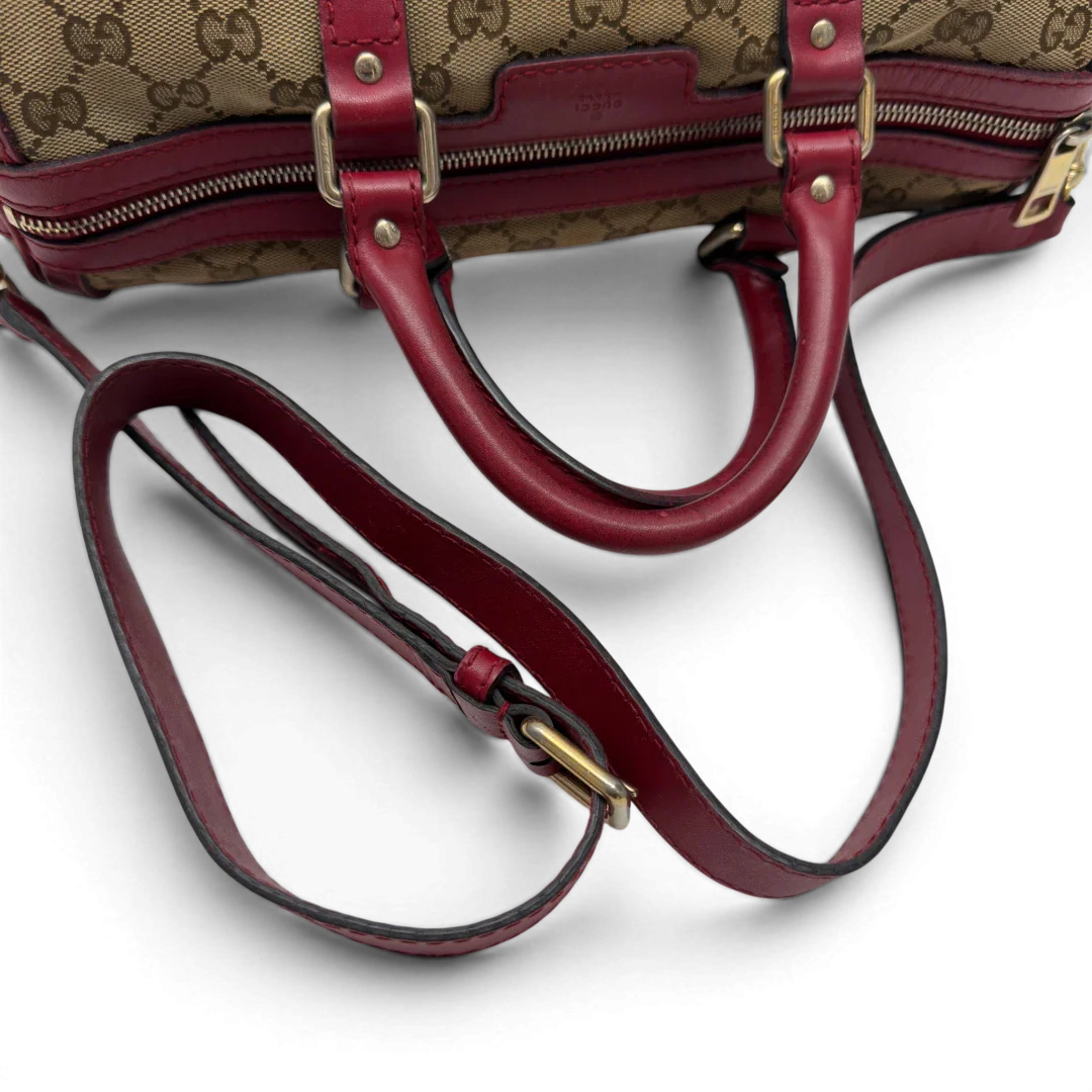 https://cdn.shopify.com/s/files/1/0564/9376/8855/files/Gucci_Handtasche_Boston_Bag_mit_Umhangegurt_monogram_beige_10.webp?v=1782909010