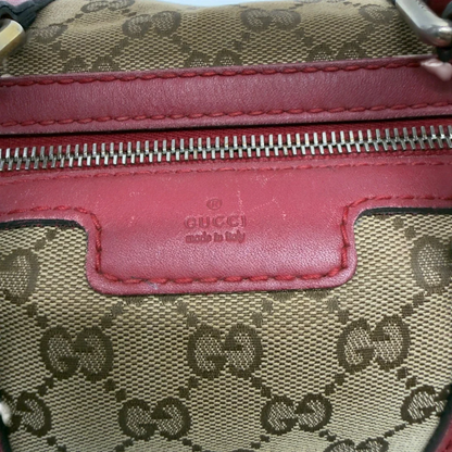 https://cdn.shopify.com/s/files/1/0564/9376/8855/files/Gucci_Handtasche_Boston_Bag_mit_Umhangegurt_monogram_beige_12.webp?v=1782909010