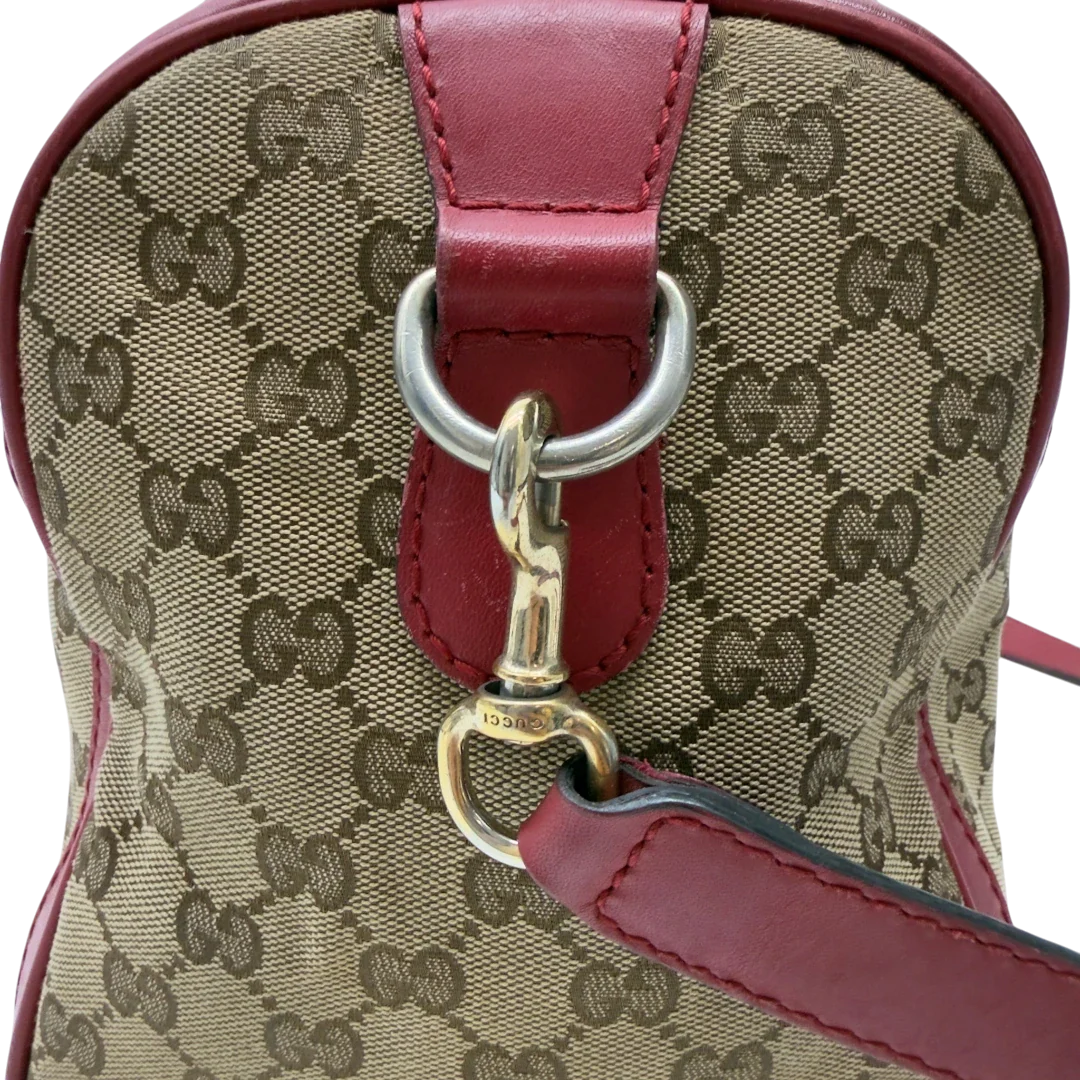 https://cdn.shopify.com/s/files/1/0564/9376/8855/files/Gucci_Handtasche_Boston_Bag_mit_Umhangegurt_monogram_beige_15.webp?v=1782909009