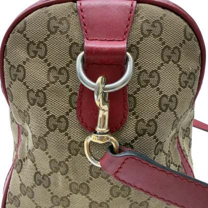 https://cdn.shopify.com/s/files/1/0564/9376/8855/files/Gucci_Handtasche_Boston_Bag_mit_Umhangegurt_monogram_beige_15.webp?v=1782909009