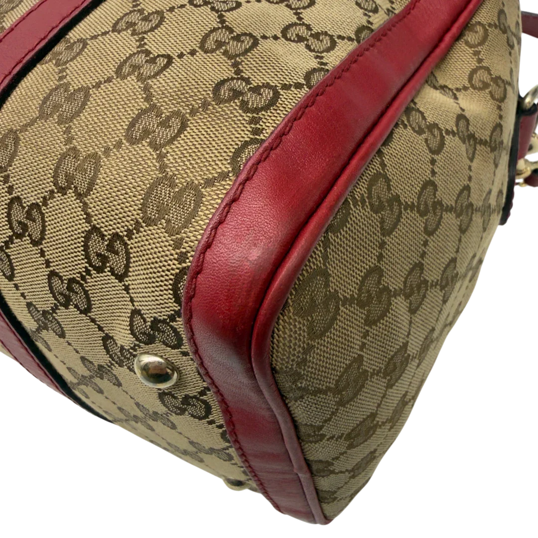 https://cdn.shopify.com/s/files/1/0564/9376/8855/files/Gucci_Handtasche_Boston_Bag_mit_Umhangegurt_monogram_beige_9.webp?v=1782909009