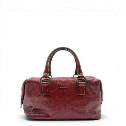 https://cdn.shopify.com/s/files/1/0564/9376/8855/files/Gucci_Handtasche_Boston_bag_aus_Leder_Rot_vintage_GG2890.webp?v=1774004038