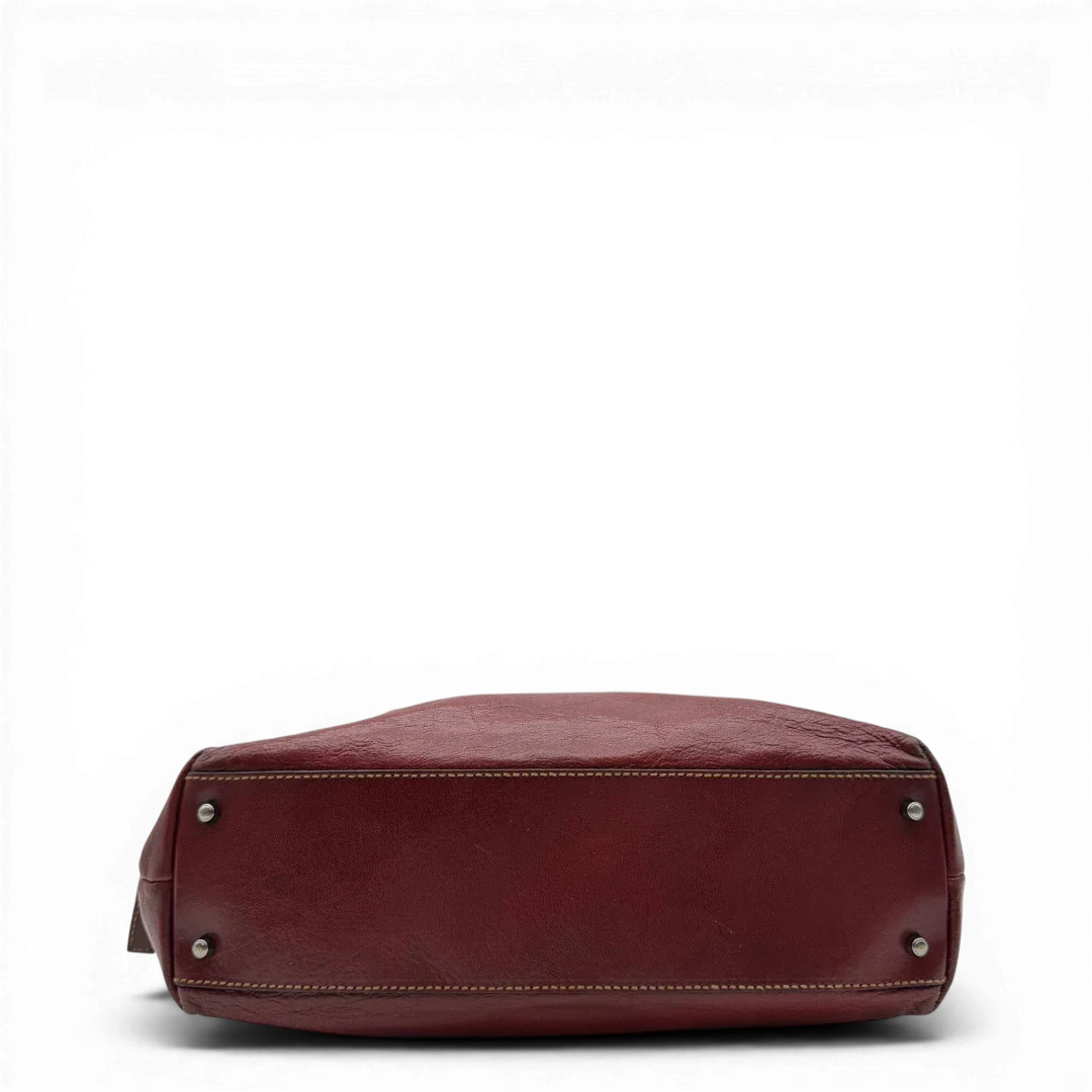 https://cdn.shopify.com/s/files/1/0564/9376/8855/files/Gucci_Handtasche_Boston_bag_aus_Leder_Rot_vintage_GG2898.webp?v=1774010468